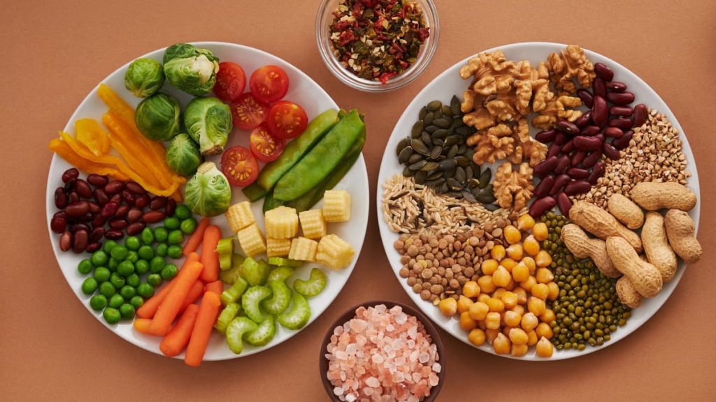 Vibrant display of assorted vegetables, legumes, nuts, and seeds on plates, perfect for healthy eating images.